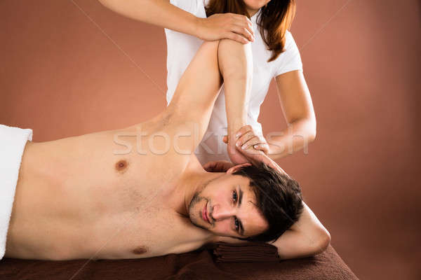 Junger Mann Massage entspannt spa Sport Körper Stock foto © AndreyPopov