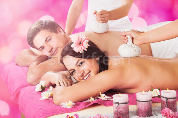 Young Couple Getting Massage In Spa Stock photo © AndreyPopov