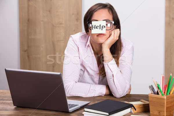 Businesswoman With Text Help On Sticky Note Stock photo © AndreyPopov