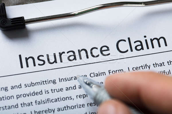 High Angle View Of Insurance Claim Form Stock photo © AndreyPopov
