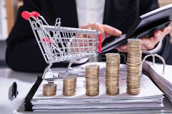 Stack Of Increasing Coins And Shopping Cart Stock photo © AndreyPopov
