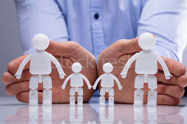 Person Protecting Family Human Figures Stock photo © AndreyPopov