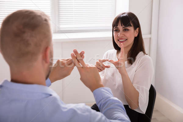 Man vrouw teken talen Stockfoto © AndreyPopov