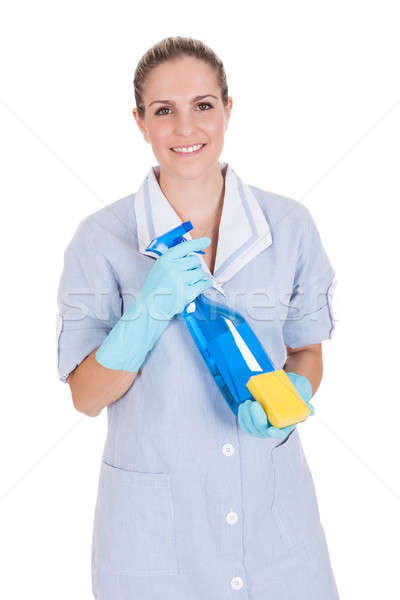 Woman Holding Cleaning Liquid And Scrubber Stock photo © AndreyPopov