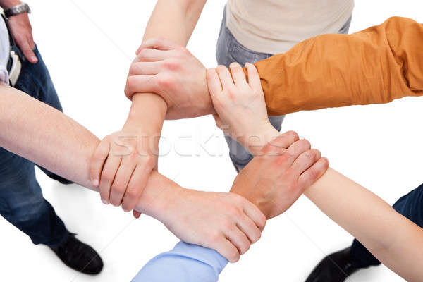 Friends Linking Hands In Team Stock photo © AndreyPopov