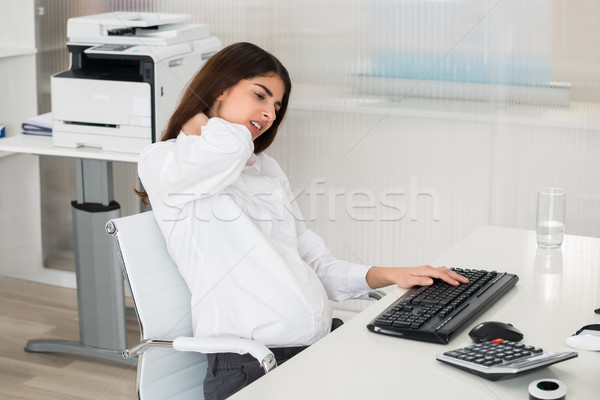 Pregnant Woman Suffering From Neck Pain Stock photo © AndreyPopov