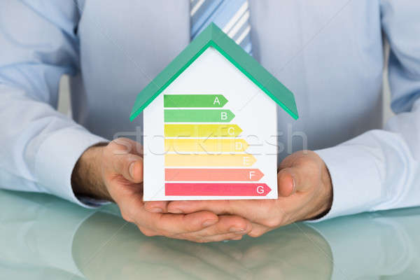 Stock fotó: üzletember · ház · modell · mutat · energiahatékonyság · gyakoriság
