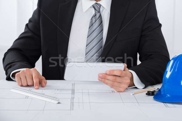 Male Architecture Using Digital Tablet Stock photo © AndreyPopov