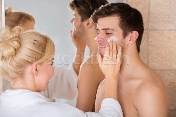 Nő arckrém férfi orr fürdőszoba fiatal nő Stock fotó © AndreyPopov
