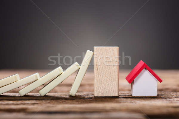 Tömés dominó darabok otthonbiztosítás közelkép fából készült Stock fotó © AndreyPopov