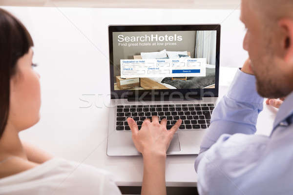 Pár keres online hotelek laptop közelkép Stock fotó © AndreyPopov