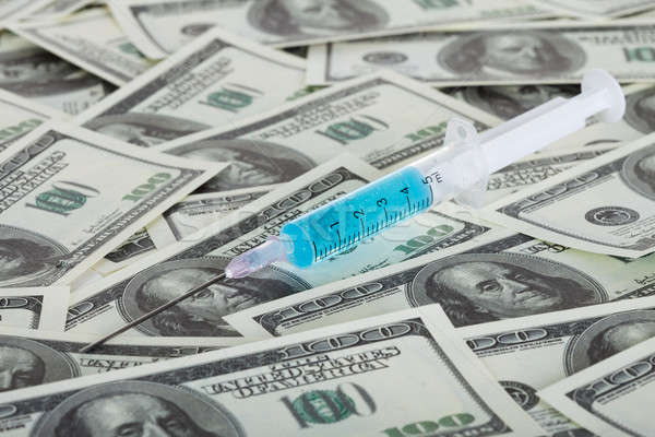 Drugs and american dollars Stock photo © AndreyPopov