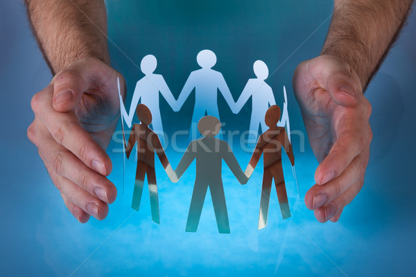 Hand With Paper People Stock photo © AndreyPopov
