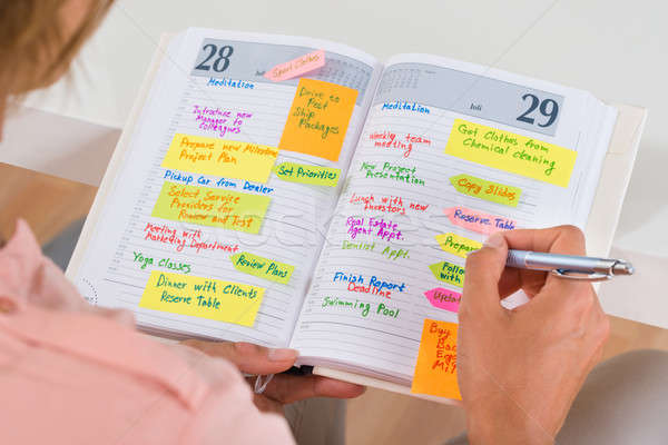 Frau Liste Büroarbeit Tagebuch Stock foto © AndreyPopov