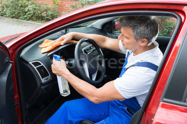 Man Cleaning Car Interior Stock Photo C Andriy Popov