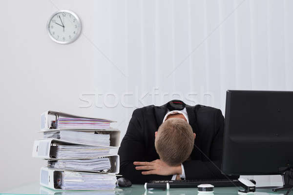 Male Businessman Sleeping In Office Stock photo © AndreyPopov