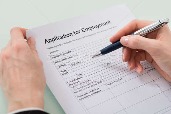 Woman Hand Filling Employment Form Stock photo © AndreyPopov