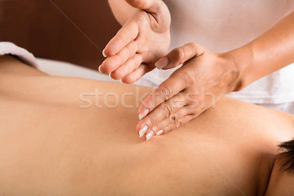 Close-up Of A Man Receiving Back Massage Stock photo © AndreyPopov