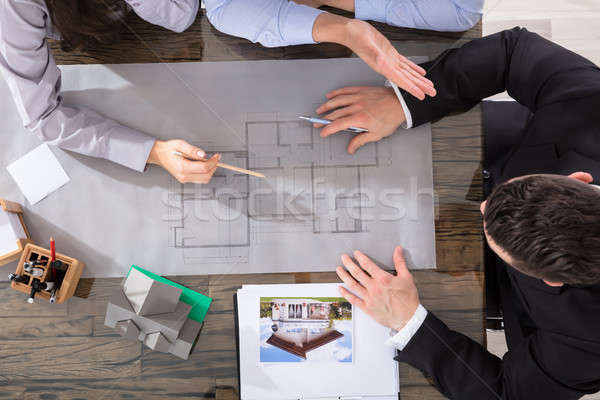 Pár építész dolgozik terv kilátás üzlet Stock fotó © AndreyPopov