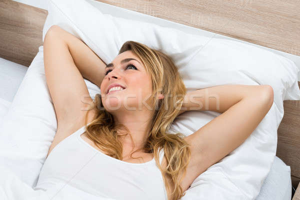 Young Woman Daydreaming Stock photo © AndreyPopov