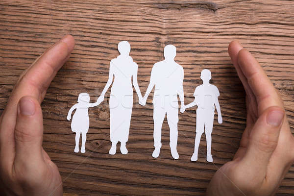 Person Hand Protecting Family Papercut Stock photo © AndreyPopov