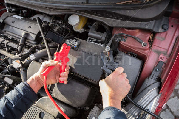 Person Using Jumper Cables To Charge Car's Dead Battery Stock photo © AndreyPopov