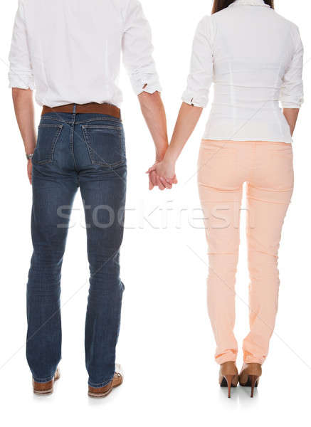 Portrait Of Young Couple Holding Hands Stock photo © AndreyPopov