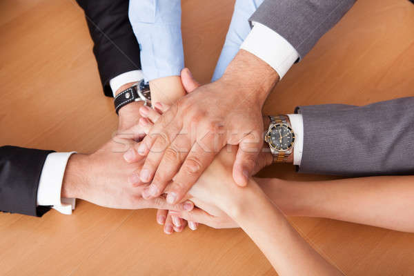 Businesspeople Stacking Hands Stock photo © AndreyPopov