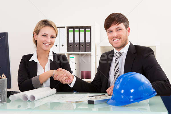 Architects shaking hands in the office Stock photo © AndreyPopov