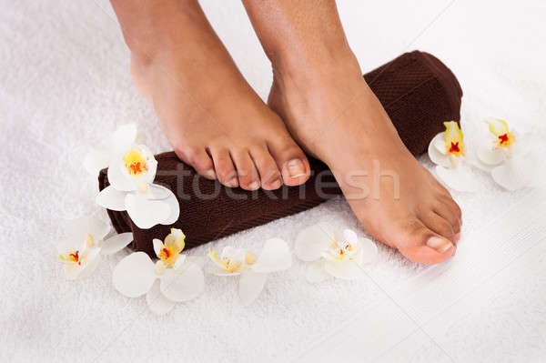 Close-up Of Human Foot Getting Aroma Therapy Stock photo © AndreyPopov
