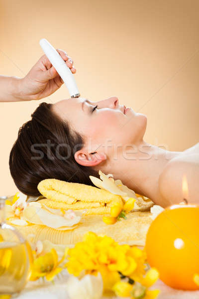 Woman Receiving Microdermabrasion Therapy On Forehead At Spa Stock photo © AndreyPopov