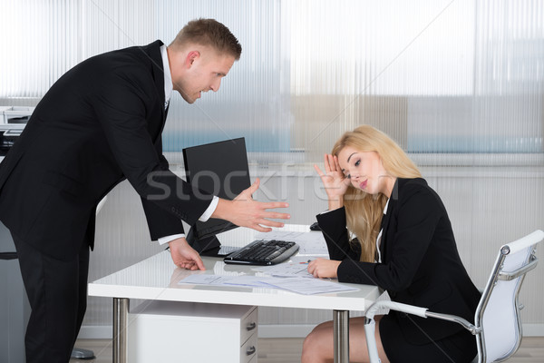 Szef pracownika posiedzenia biurko kobiet Zdjęcia stock © AndreyPopov