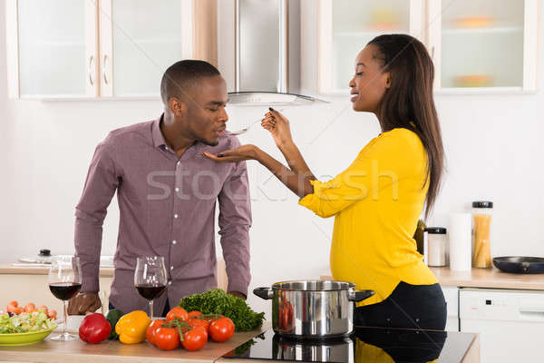 Man Testing Food Stock photo © AndreyPopov