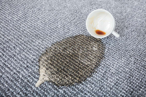 Coffee Cup Spilled On The Carpet Stock photo © AndreyPopov