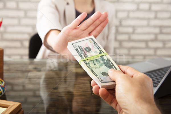 Businesswoman Refusing To Take Bribe From Partner Stock photo © AndreyPopov