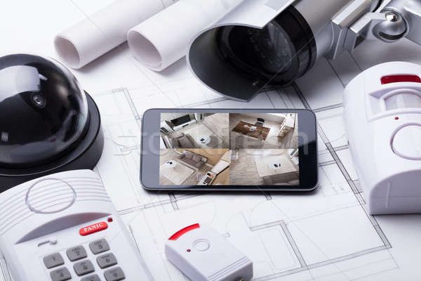 Smart Home System On Mobilephone With Security Equipment Stock photo © AndreyPopov