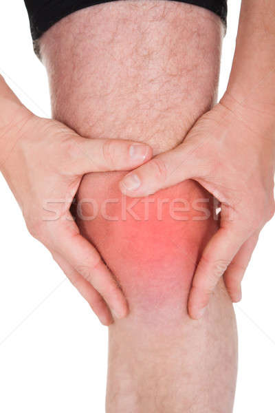 Férfi térd fájdalom fehér sport egészség Stock fotó © AndreyPopov