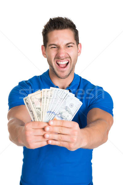 Homem gritando papel moeda retrato moço Foto stock © AndreyPopov