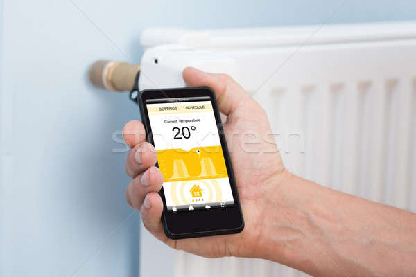 人 手 溫度 恆溫器 手機 商業照片 © AndreyPopov