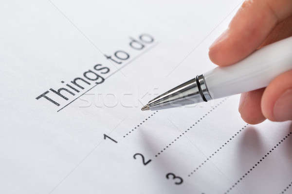 Person Planning List Of Work To Do Stock photo © AndreyPopov