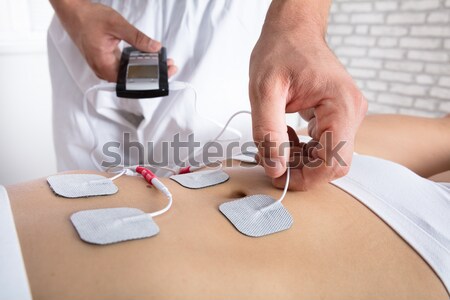 Doctor Injecting Injection To Patient Stock photo © AndreyPopov