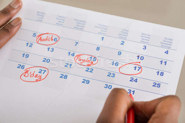 Person Marking Important Date On Calendar Stock photo © AndreyPopov