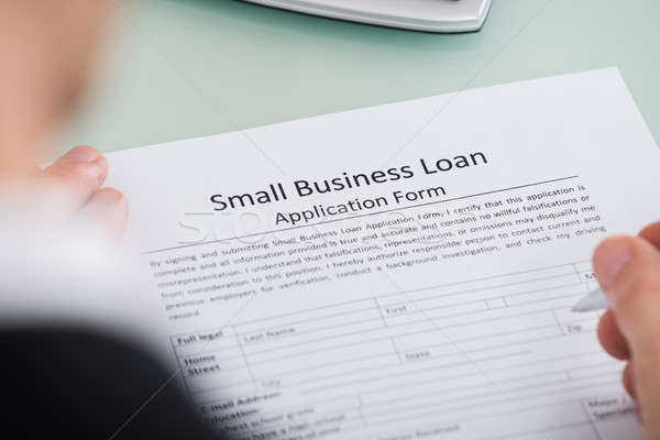Persoon hand kleine bedrijven lening toepassing vorm Stockfoto © AndreyPopov