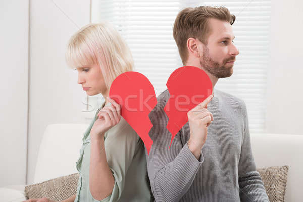 Couple Holding Red Broken Heart Stock photo © AndreyPopov
