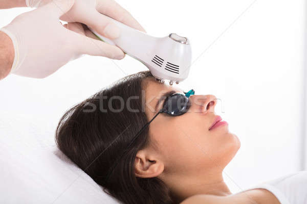 Woman Getting A Ultrasound Skin Treatment Stock photo © AndreyPopov