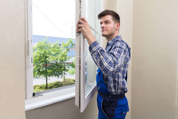 Handyman Installing Window Stock photo © AndreyPopov