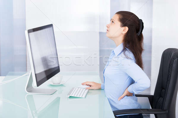 Zakenvrouw lijden rugpijn portret jonge business Stockfoto © AndreyPopov