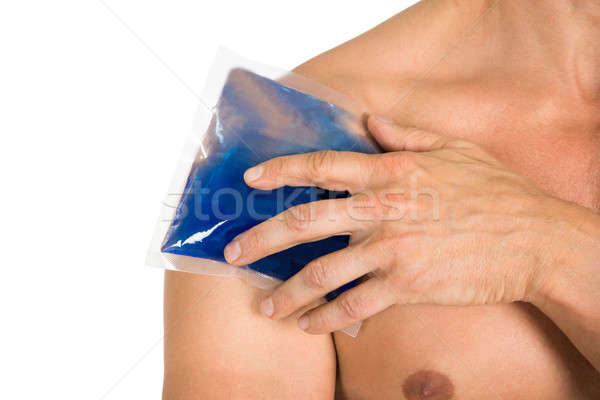 Mão gelo gel empacotar ombro Foto stock © AndreyPopov