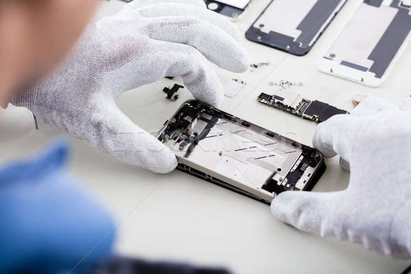 Technician Repairing Mobile Phone Stock photo © AndreyPopov