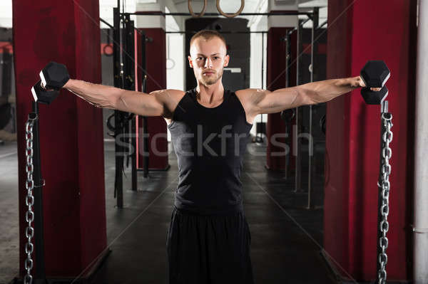 Stock photo: Man Working Out With Dumbbell